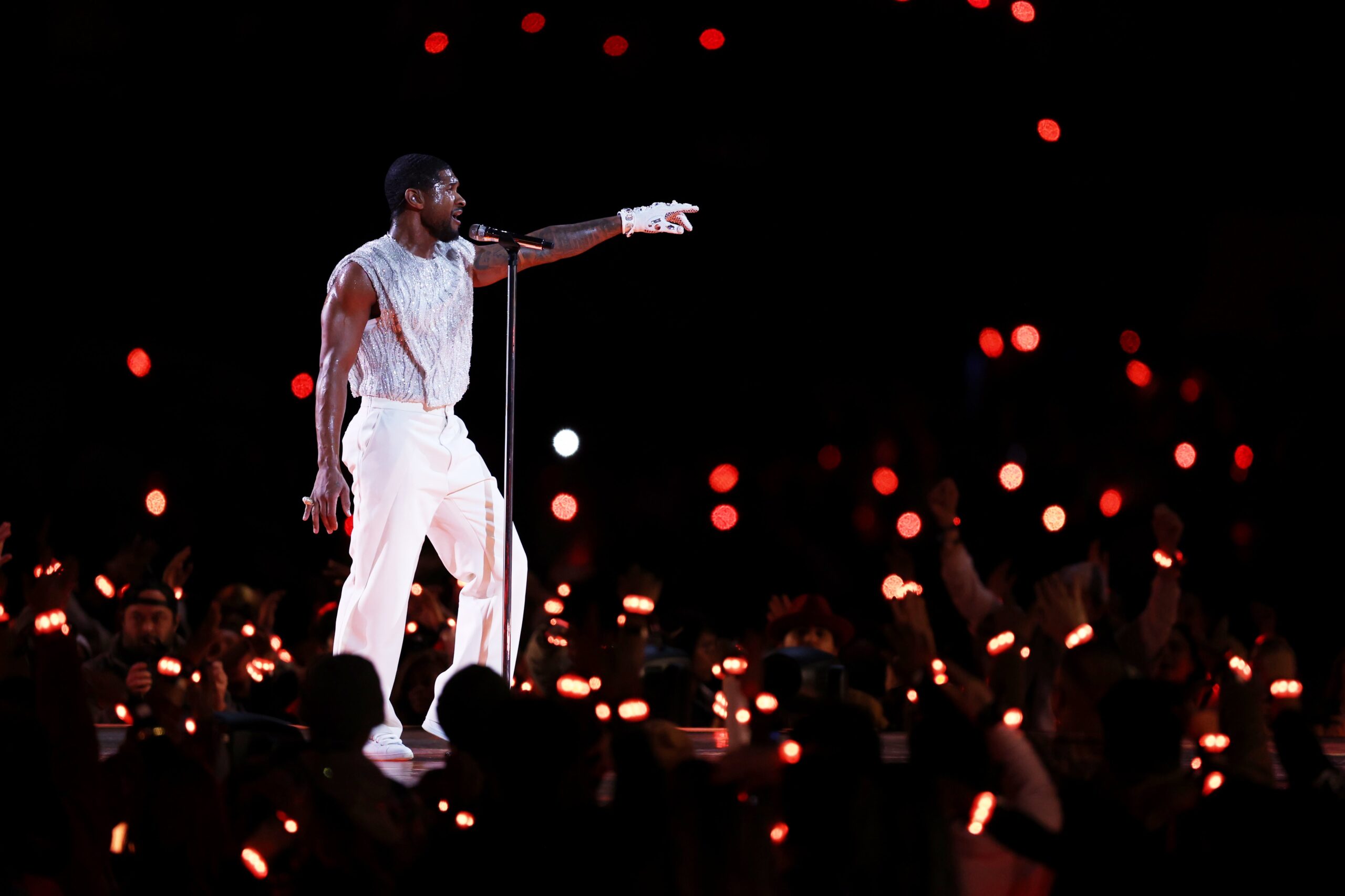 Usher performs onstage during the Apple Music Super Bowl LVIII Halftime Show at Allegiant Stadium on February 11, 2024 in Las Vegas, Nevada. Photo: Getty Images Harry How