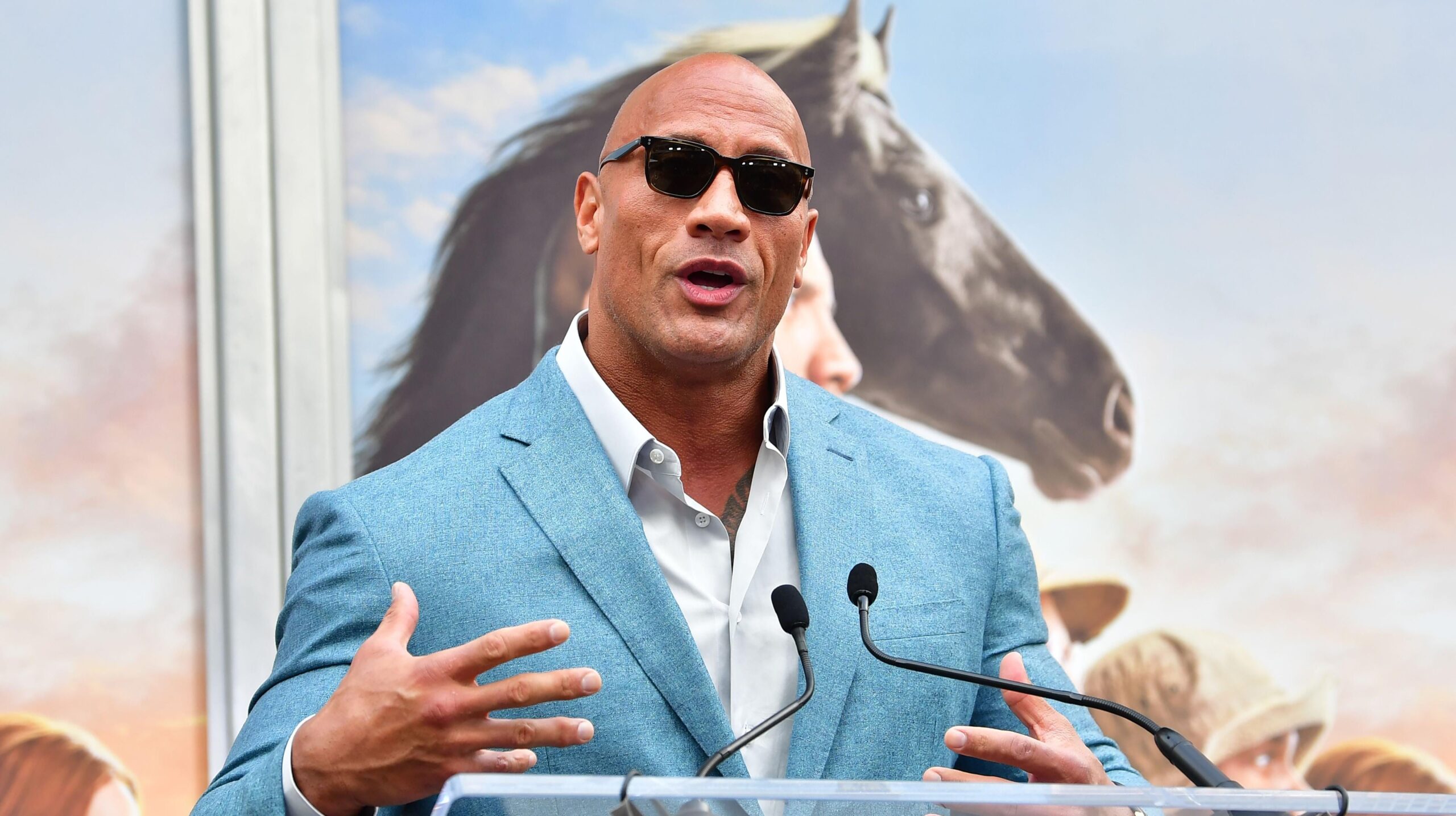 Dwayne Johnson speaks at Kevin Hart’s Hand and Footprints ceremony in Hollywood, California on December 10, 2019. Photo: Getty Images Frederic J. Brown / AFP